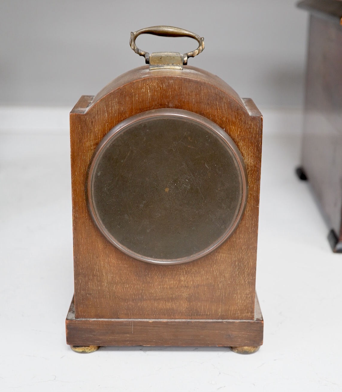 A slate mantel clock and a miniature bracket timepiece, slate clock 25cm high. Condition - miniature bracket time piece, polish on top worn,slate clock has fine scratch.